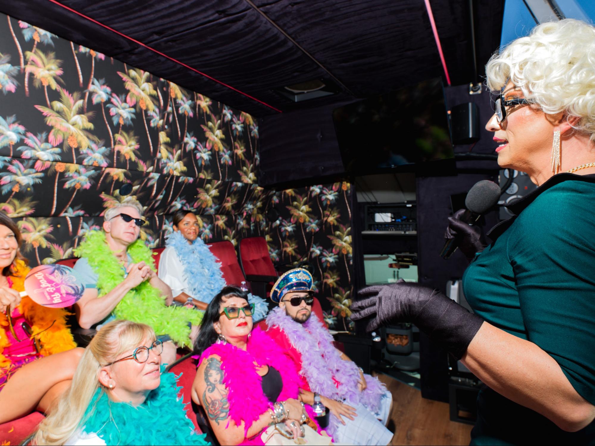Drag & Fly Tours mobile theater bus