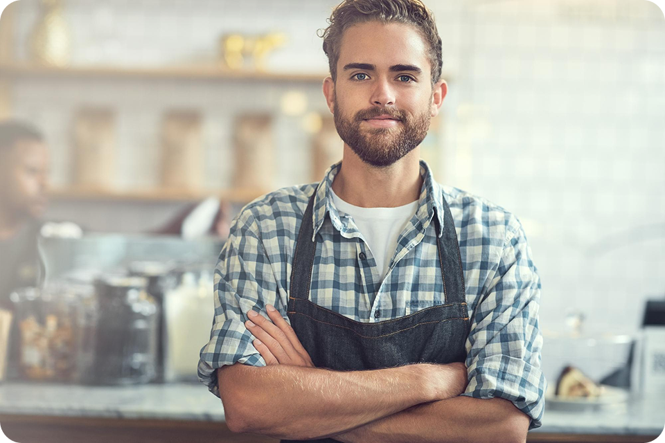 A man in an apron stands in a café or small eatery, representing hospitality and retail SMEs. ccMonet’s AI - powered financial tools (bookkeeping, dashboards) and industry - tailored services, plus expert support (tax compliance, business registration), help such businesses manage finances efficiently.
