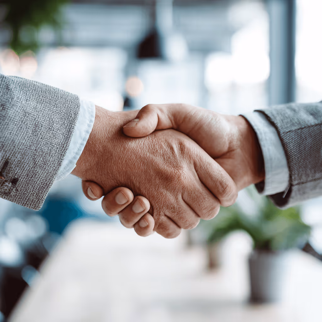 Ready Set Search team member shaking the hand of a client