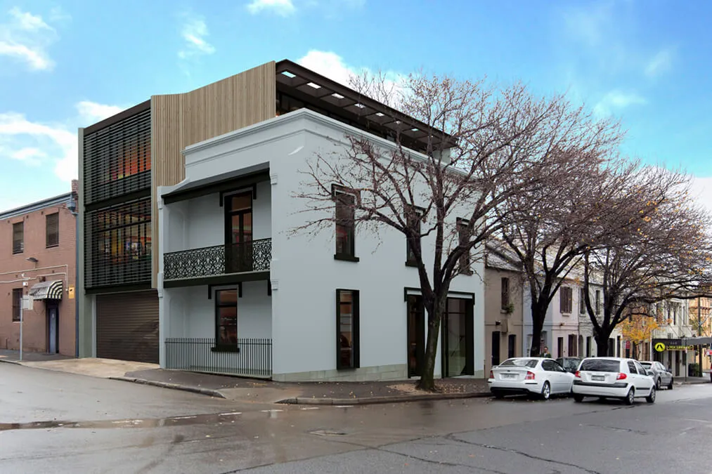 Converted historic terrace house into offices and retail space.