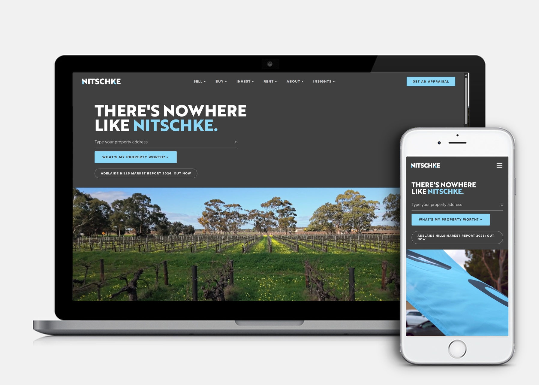 Nitschke Real Estate website shown on laptop and phone