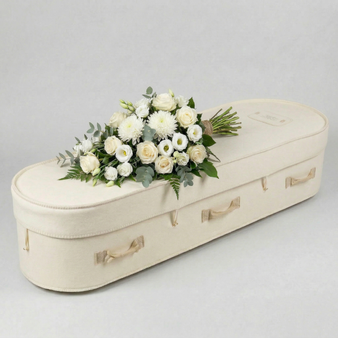 Classic hand-tied funeral flower sheaf with fuller volume — from $750