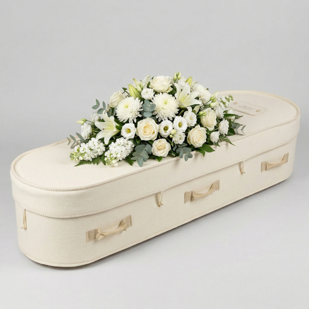 Signature funeral coffin spray with central peak — from $950
