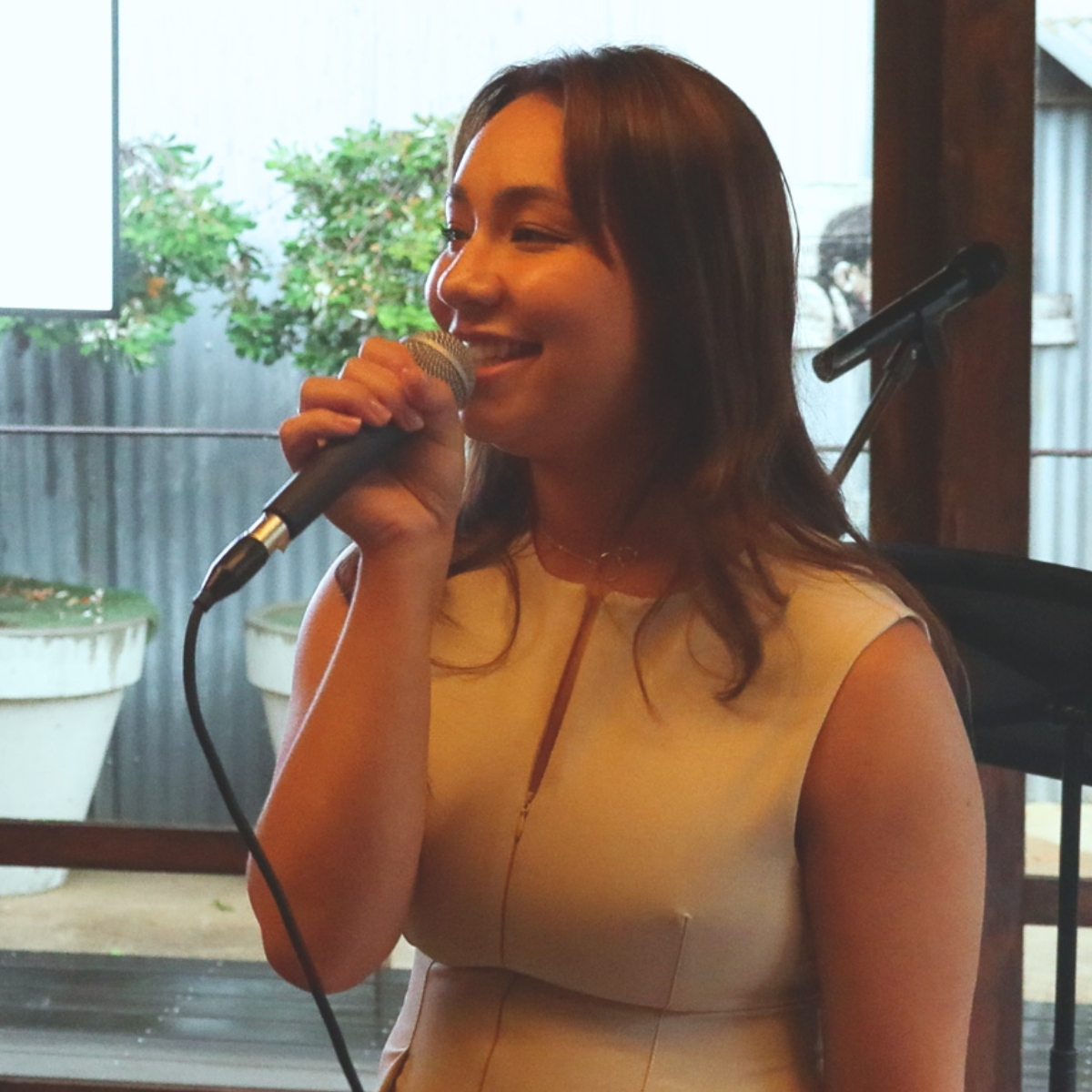 Marina Grace performing at Candour Champions evening