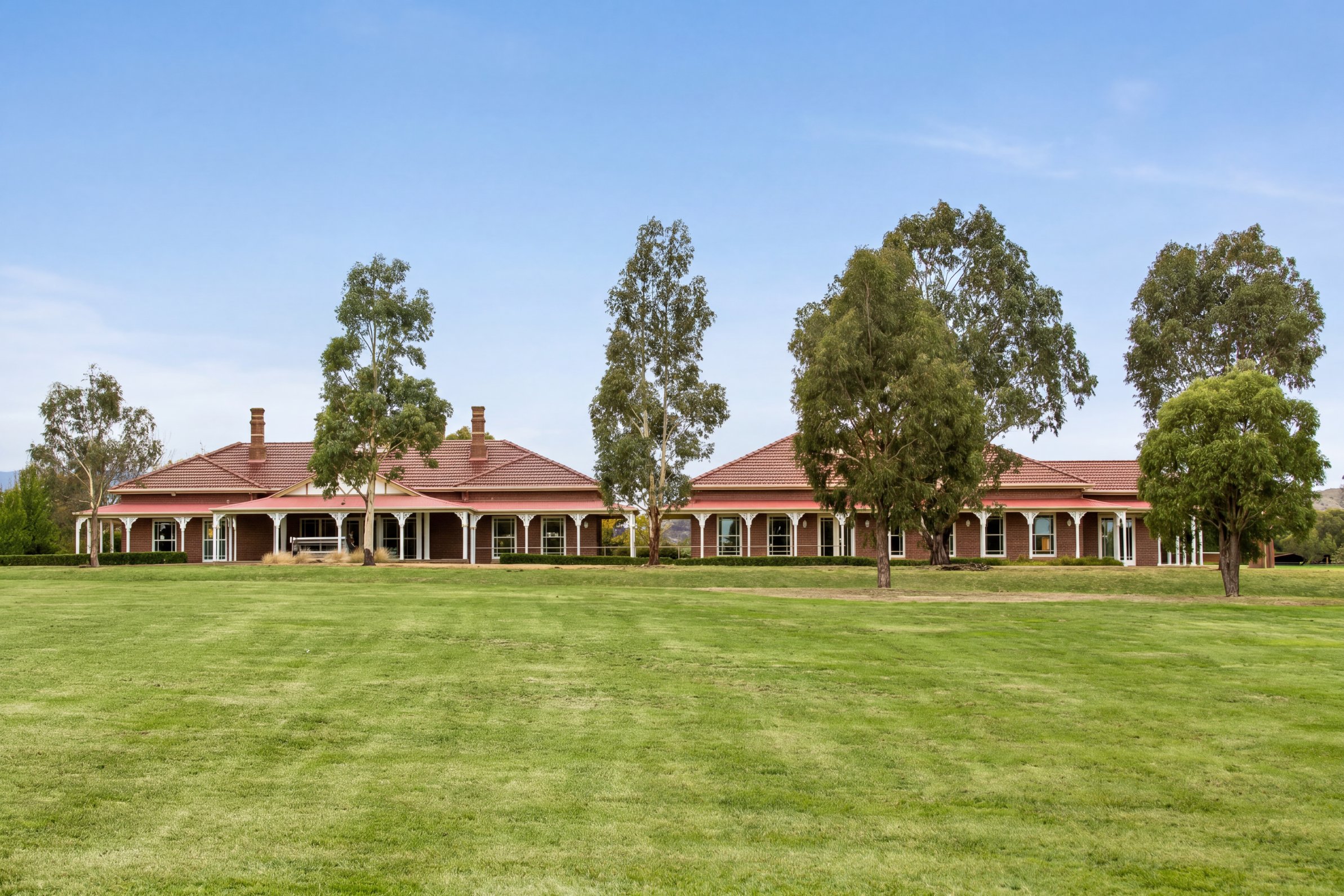 The Federation Chapel at Lilydale Memorial Park, a red-brick homestead with a wraparound verandah