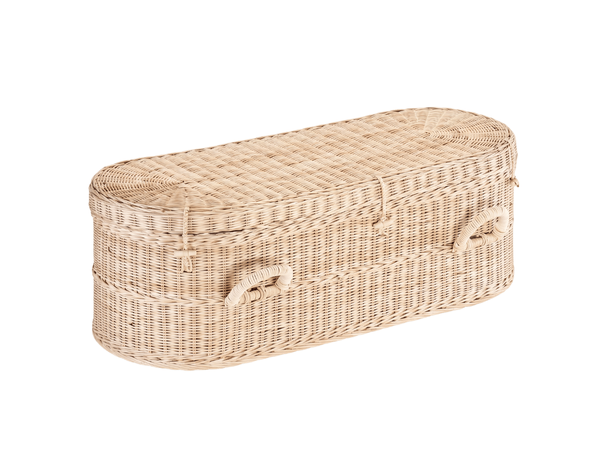 Hand-woven natural wicker casket for an infant