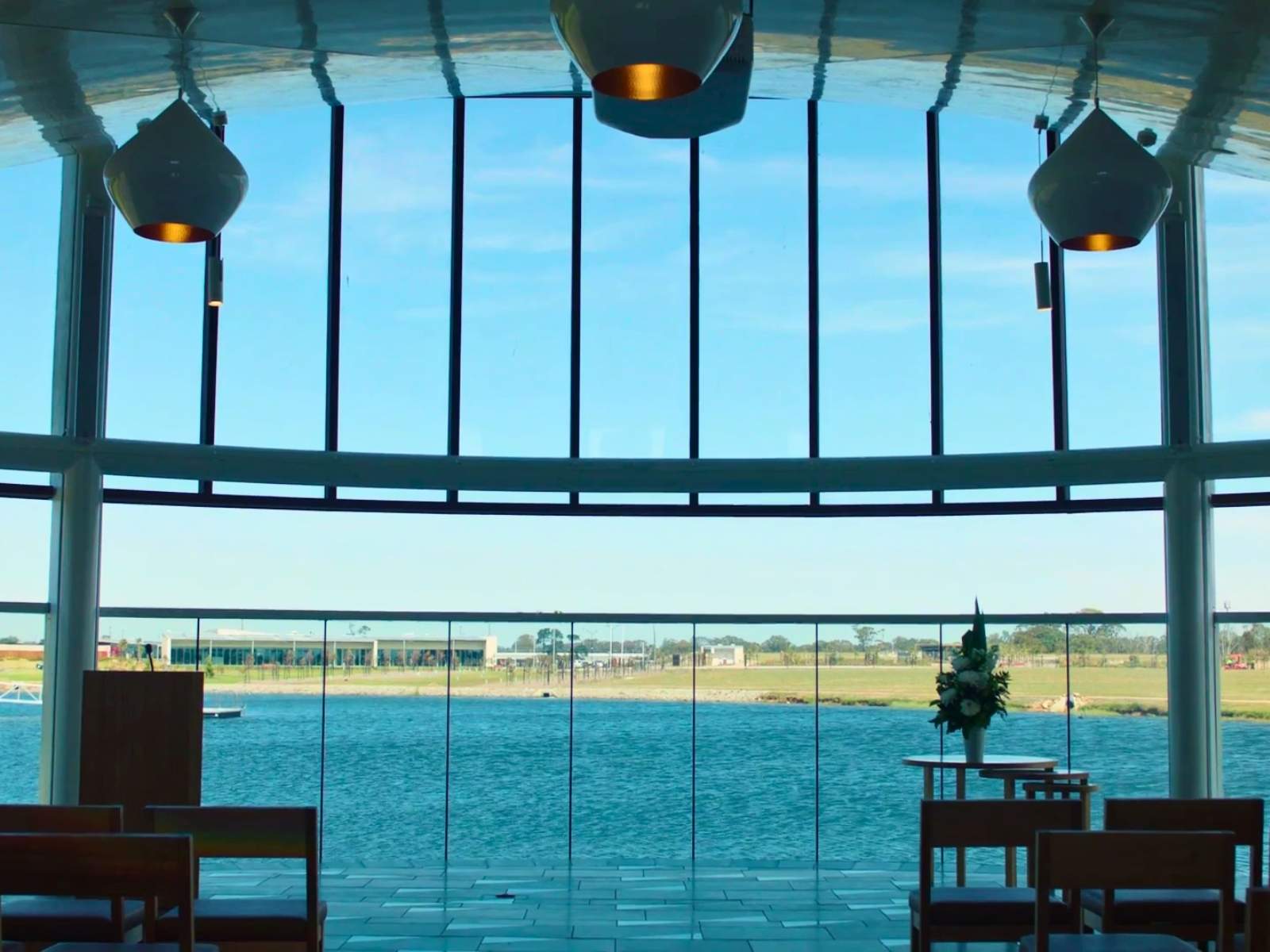 View from inside the Sanctuary chapel onto blue water of the lake australis