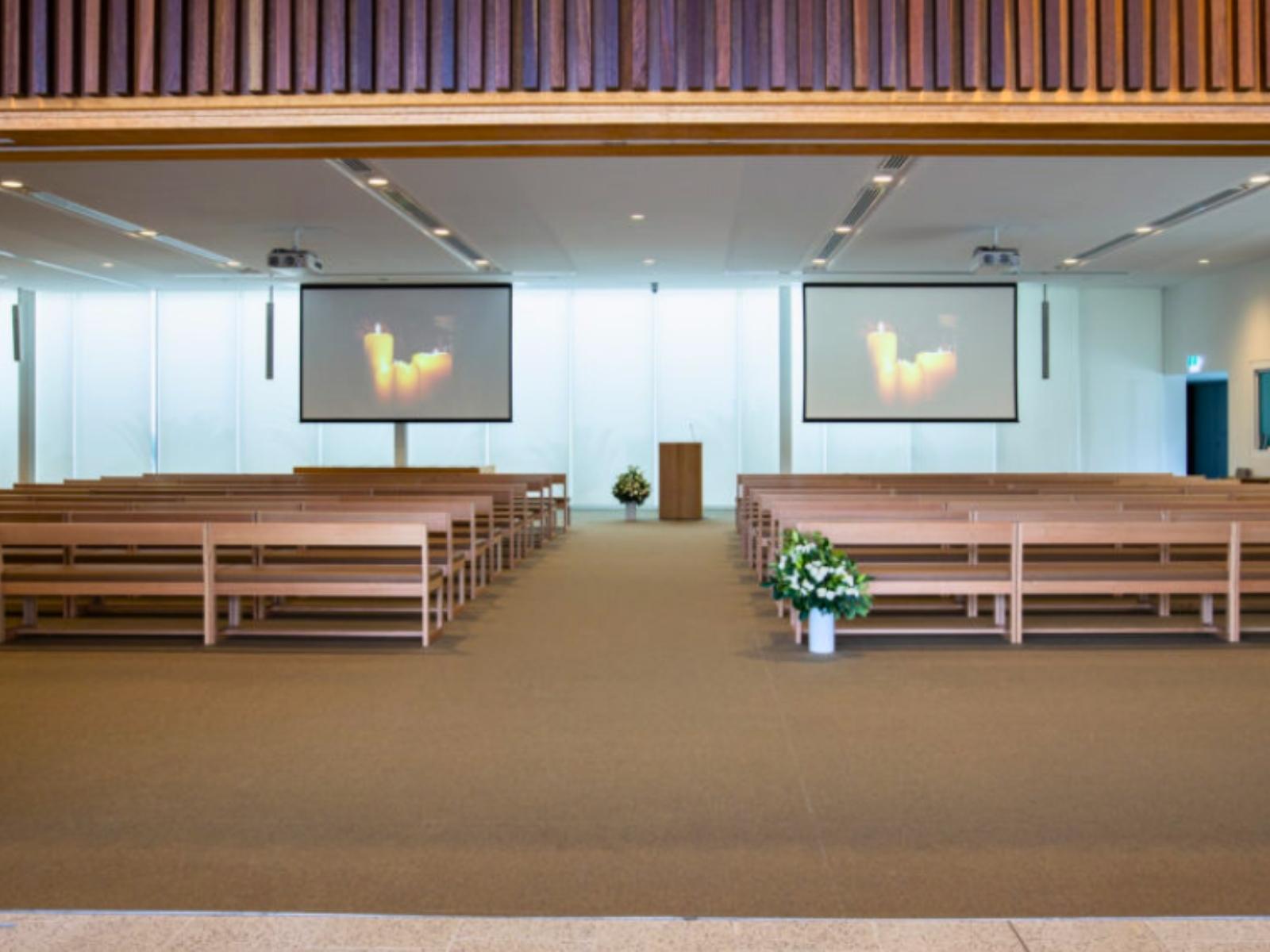 View from inside Stratus Chapel. Can see large projection screens