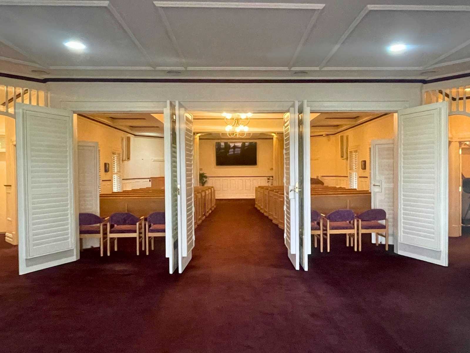 Entrance to Federation Chapel at Lilydale Memorial Park. Open doors reveal the inside of the reflection space