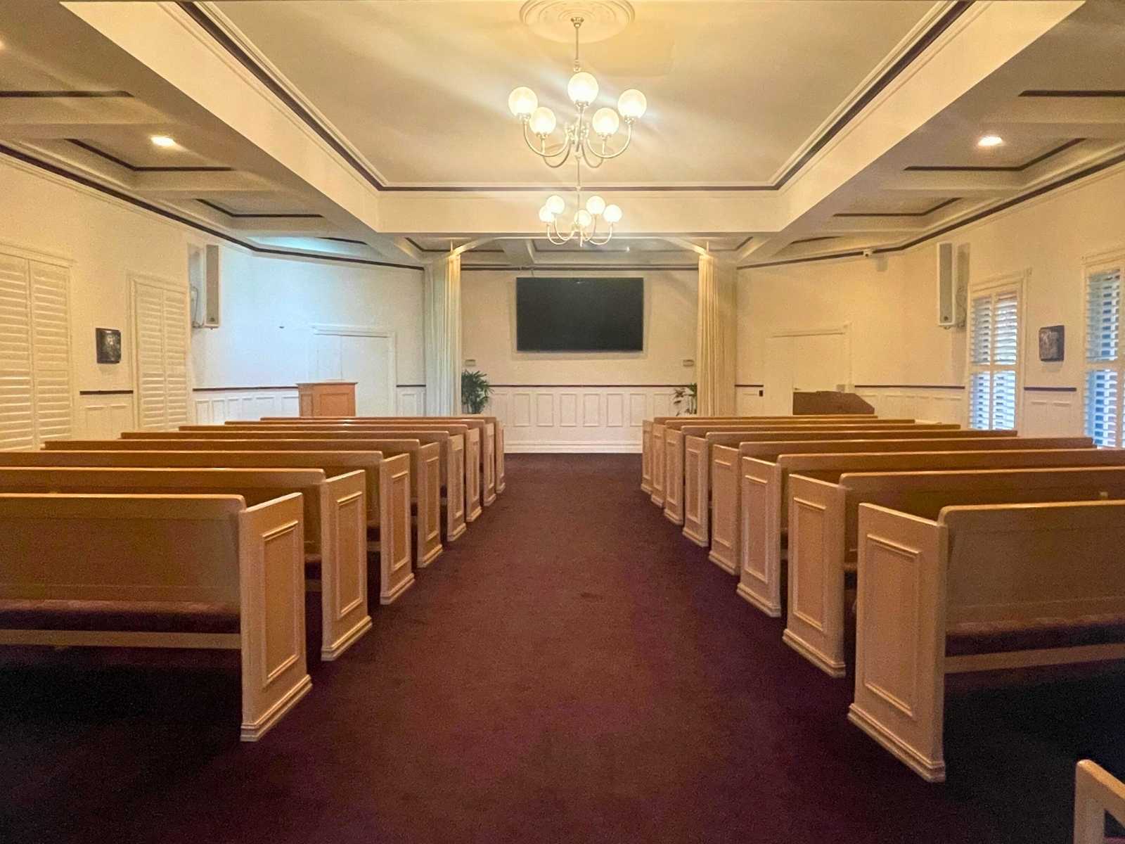 view of chairs facing forward to front of chapel at Federation chapel at Lilydale Memorial Park