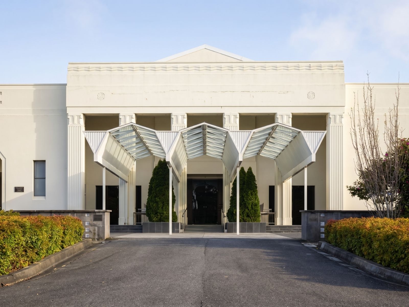 Driveway approach to Boyd Chapel at Springvale, art deco facade with folded steel entry canopies