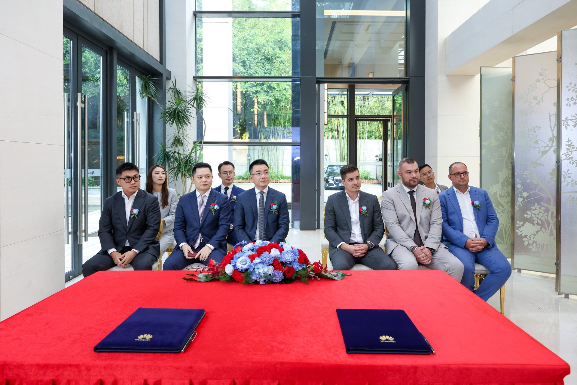 The Eldrive and Huawei delegations seated before the signing ceremony in Shenzhen