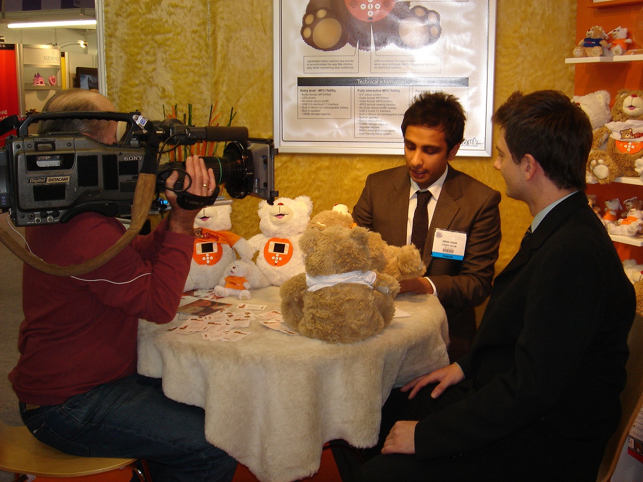 Imran Hakim being interviewed by a television crew at the iTeddy toy fair.