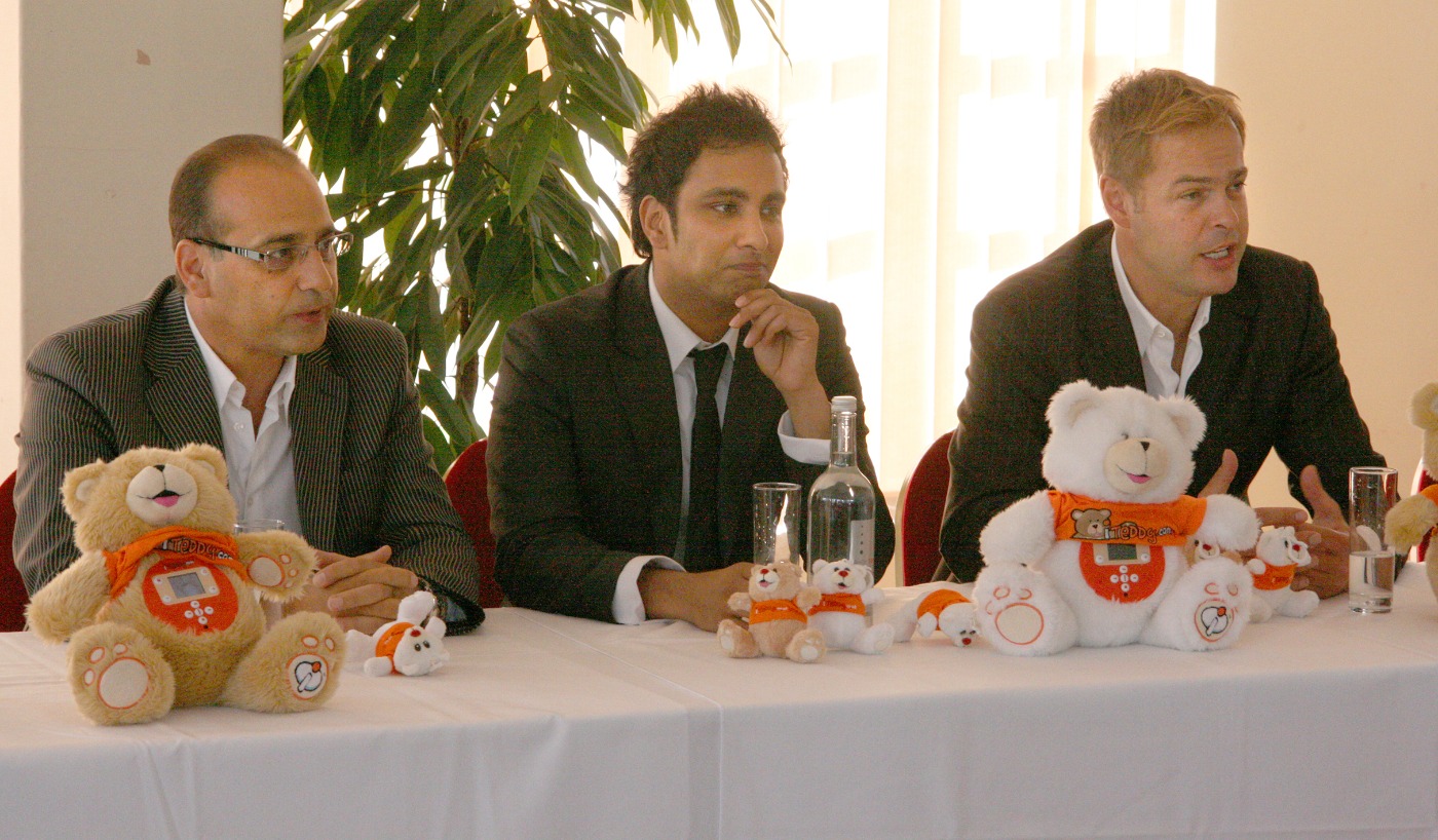 Imran Hakim speaking on a panel during a business conference or industry event.