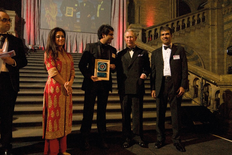 Imran Hakim receiving an award alongside fellow finalists at a formal awards ceremony.