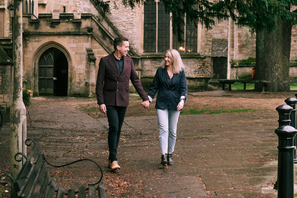 Warren & Sharon walking hand in hand along a old English walk