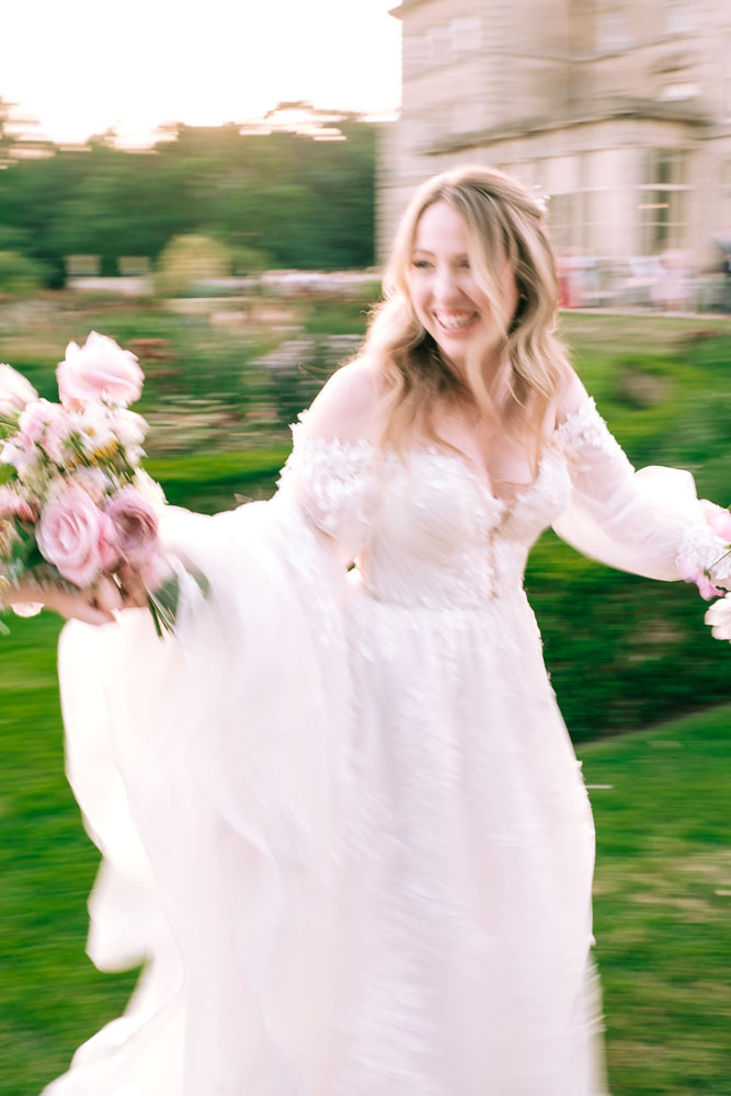 Bride dancing with her bridesmaids at Preswold Hall
