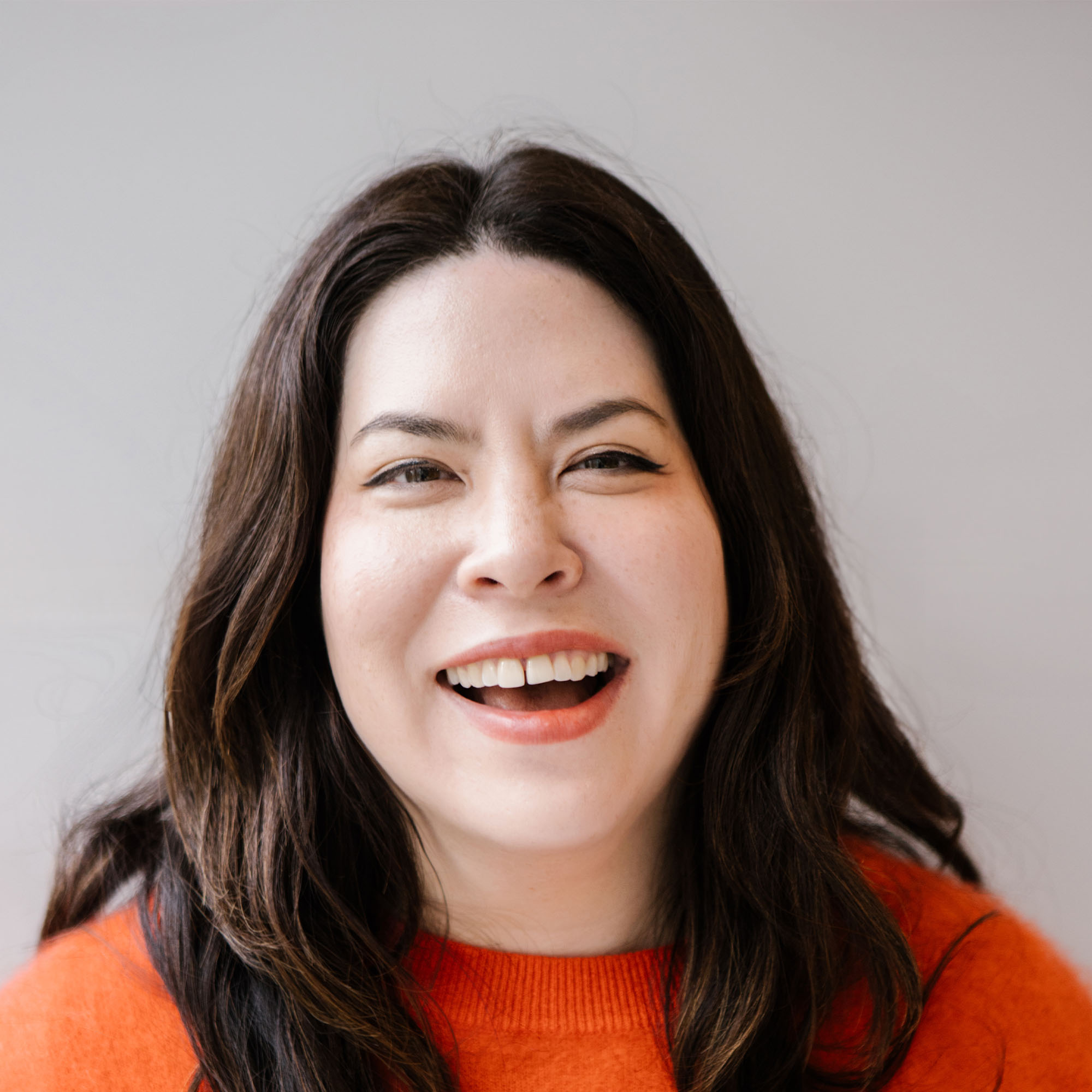 eadshot of Diana Lütgehetmann, a design consultant, with a bright and friendly expression.