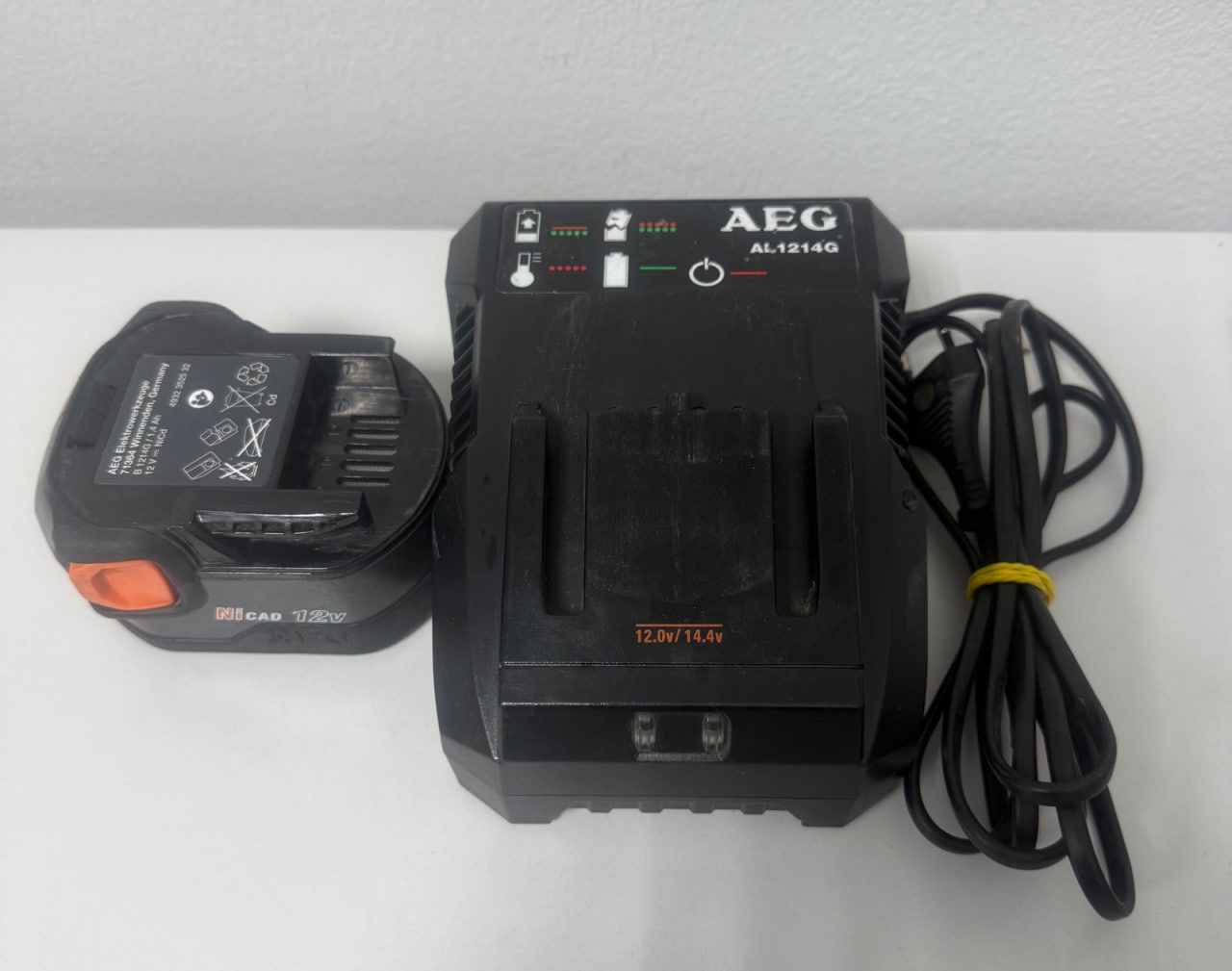 Зарядний пристрій AEG AL 1214G+акумулятор AEG 71364 12V