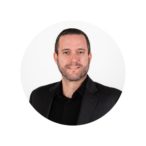 Steve Meunier smiling for the camera before going to spray a roof.