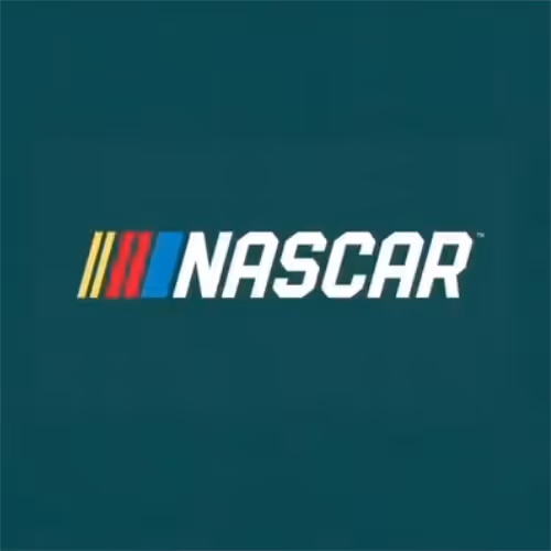 NASCAR logo with stylized red, yellow, and blue stripes on a dark background.
