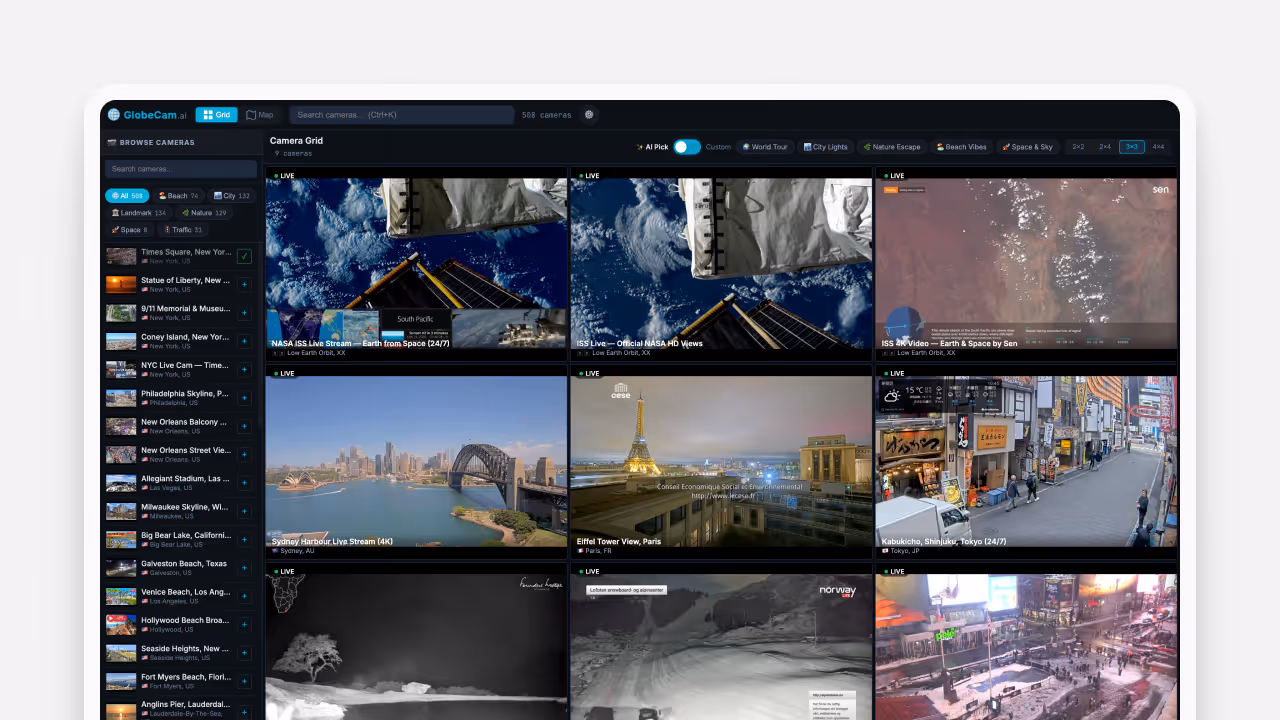 Web page showing a grid of nine live camera streams including NASA ISS views, Sydney Harbour, Eiffel Tower in Paris, Tokyo street, nighttime wildlife, and snowy landscape.