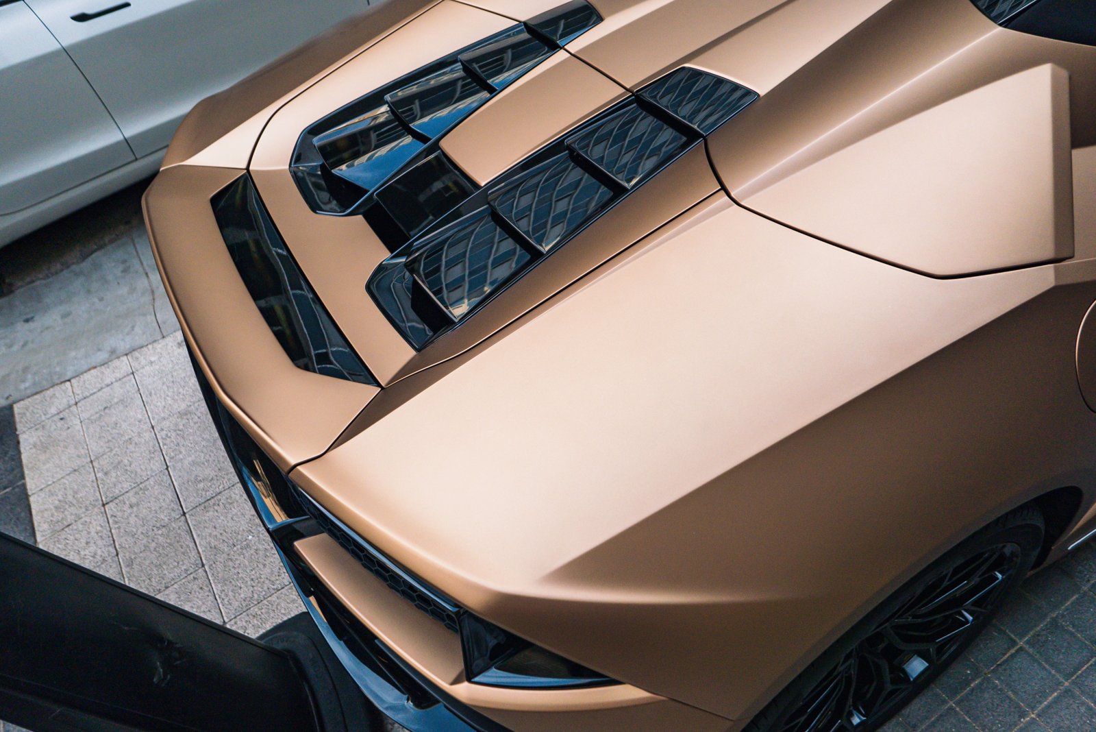 Matte gold Lamborghini with paint protection film, Supreme Wraps Peoria