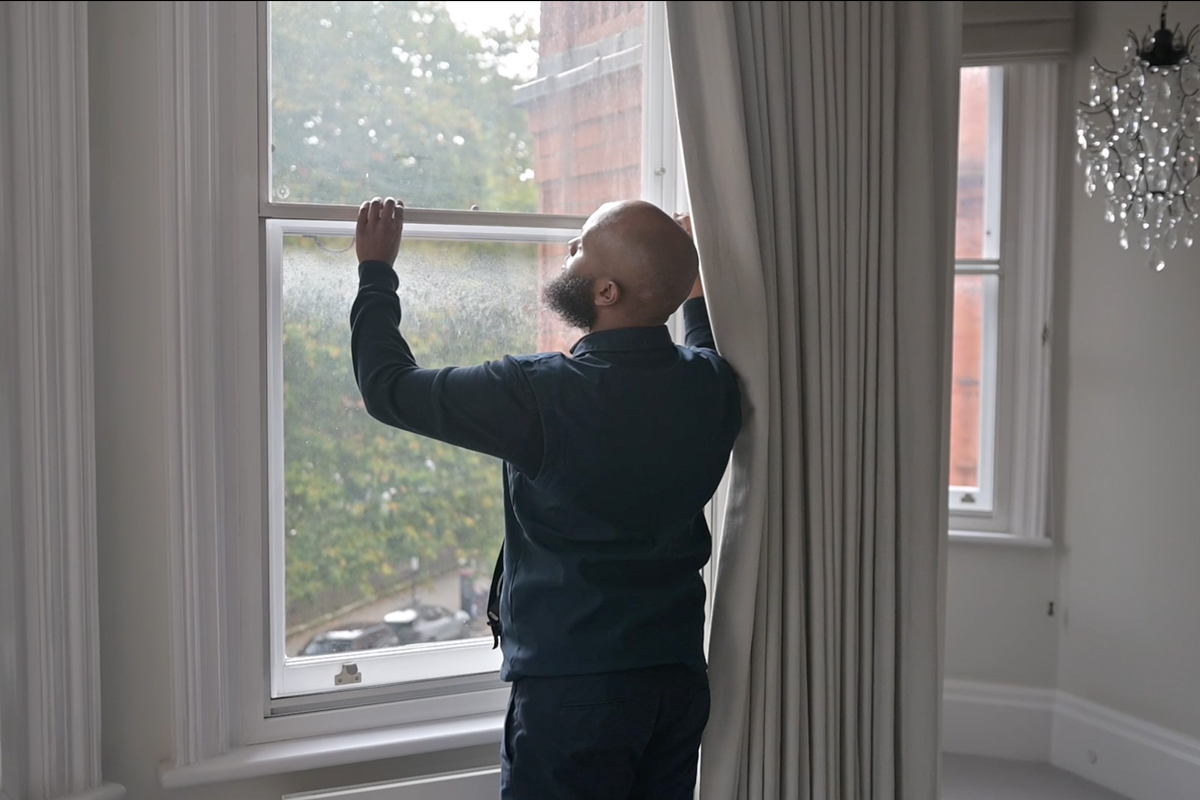 Security guard checking windows