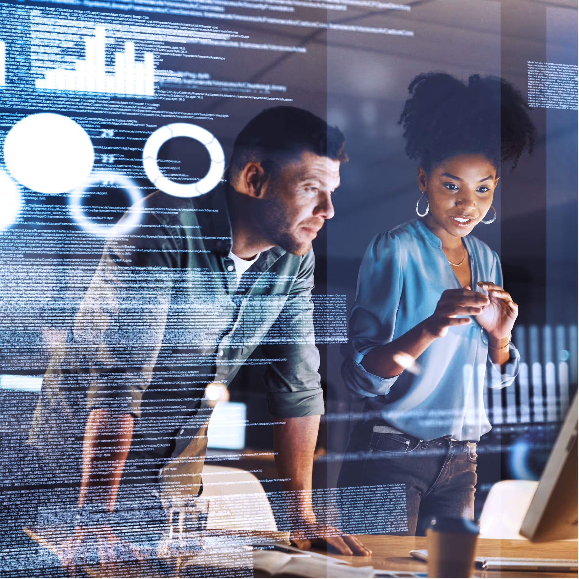 First Technology interracial coworkers looking at desktop screen