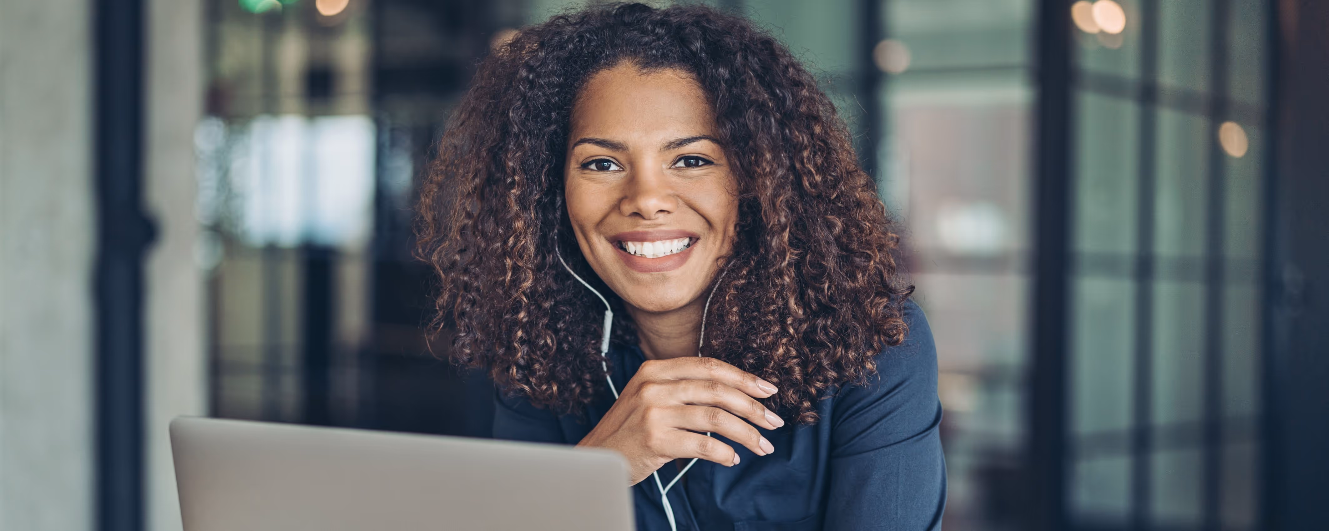 First Technology woman smiling at camera