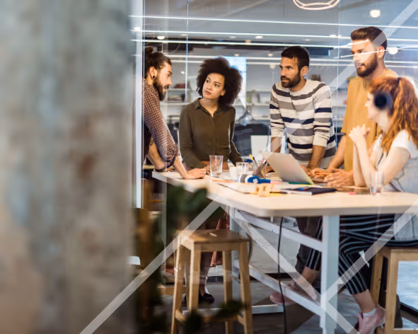A team of professionals in a meeting room