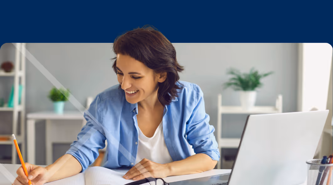 Woman sitting at a laptop First Technology Cyber Security Solutions Workshops