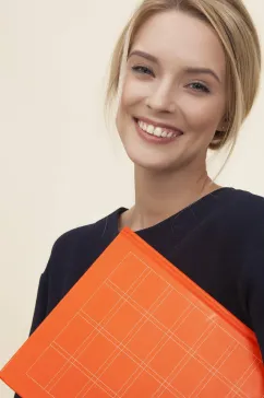 young woman with white hair smiling