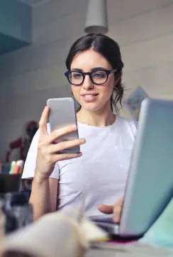 woman watching something on her phone