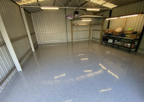 Garage after VIP epoxy flooring in Utah.