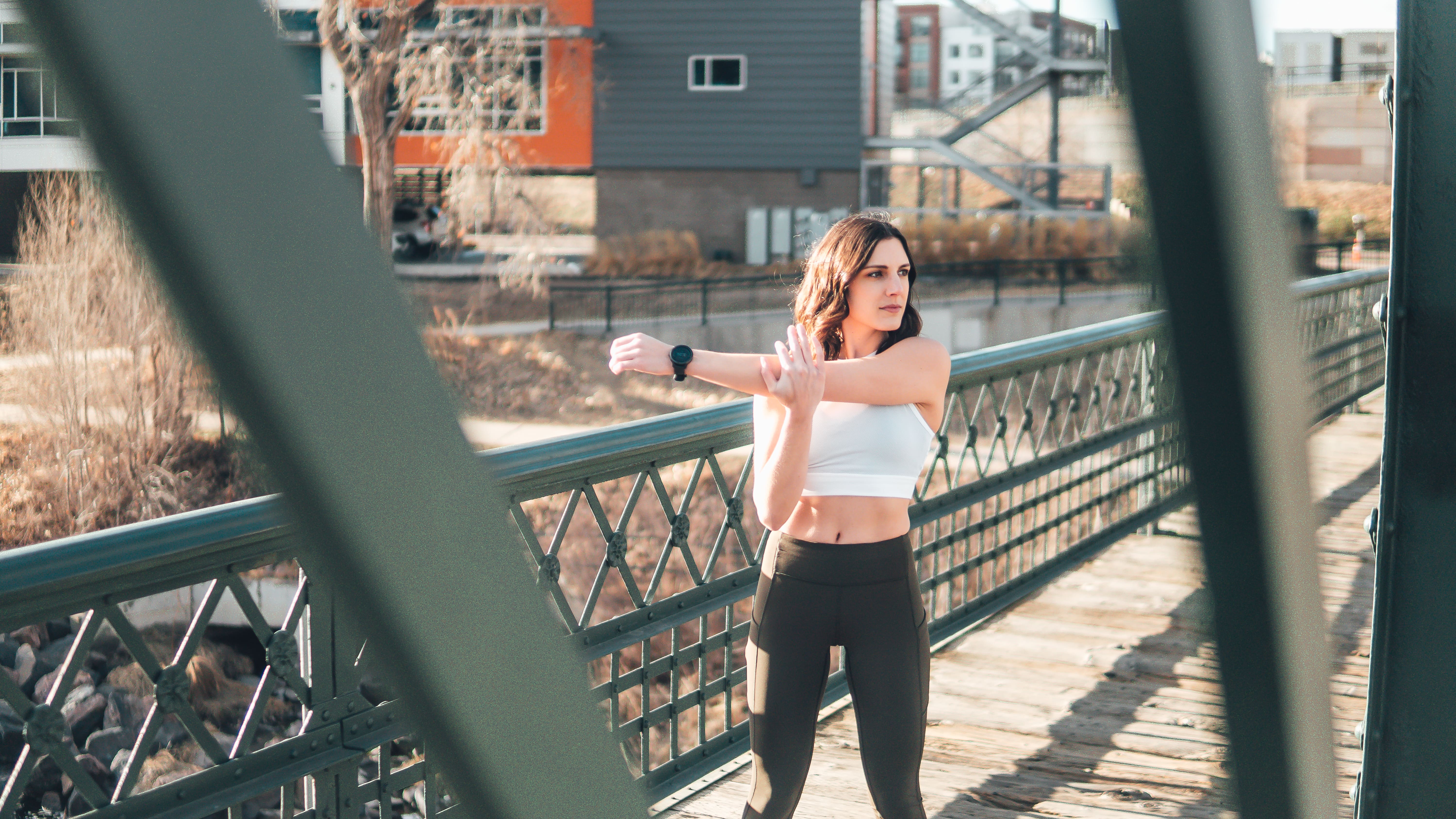 Katharine Moustakes stretching her rear delt