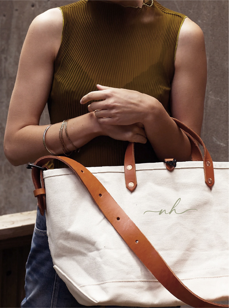 Business cards for The Links displayed on a golf course near a hole with a golf ball.
