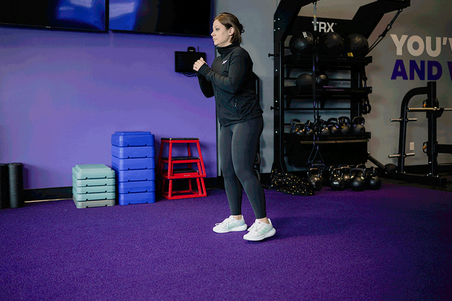 AF Coach Heather demonstrates the around the world lunge.