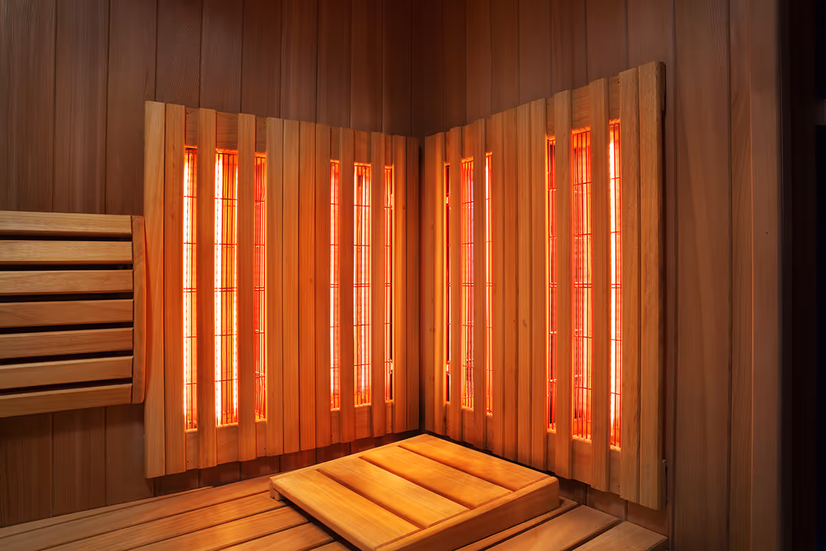 An infrared sauna with wooden panels is shown.