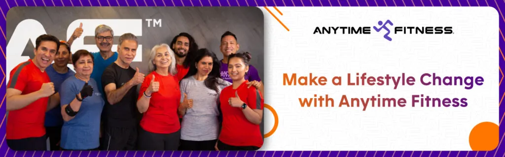 Anytime Fitness banner with the heading "Make a Lifestyle Change with Anytime Fitness." The left side features a group photo of diverse, smiling gym members of various ages giving thumbs-up in front of the "AF" logo, showcasing a supportive community environment.