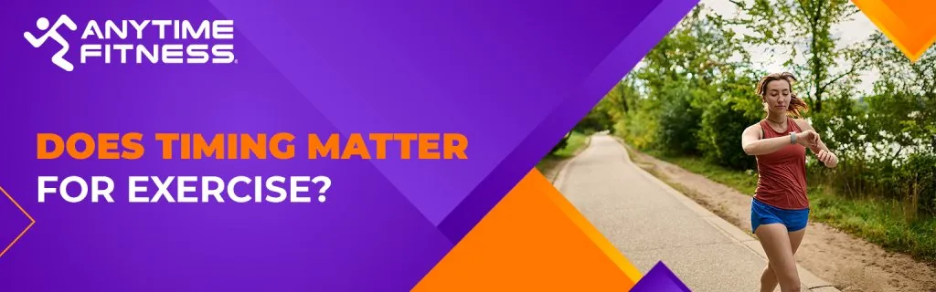 A blog banner asking "DOES TIMING MATTER FOR EXERCISE?" It features a woman in running gear jogging along a paved path next to a lake, checking her smartwatch to track her progress.