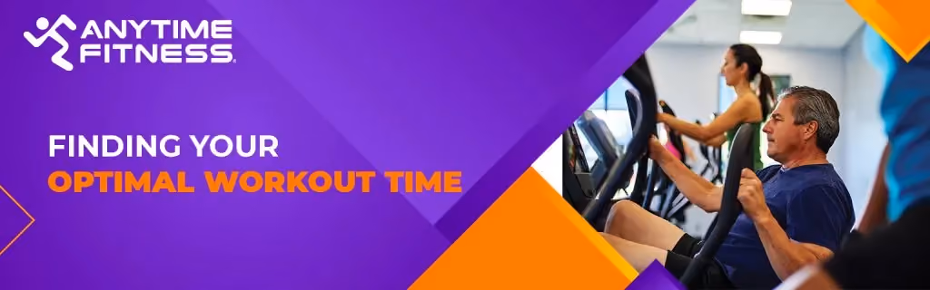 A purple and orange Anytime Fitness banner titled "FINDING YOUR OPTIMAL WORKOUT TIME." The right side shows a middle-aged man focused on a workout using an elliptical machine in a professional gym environment.
