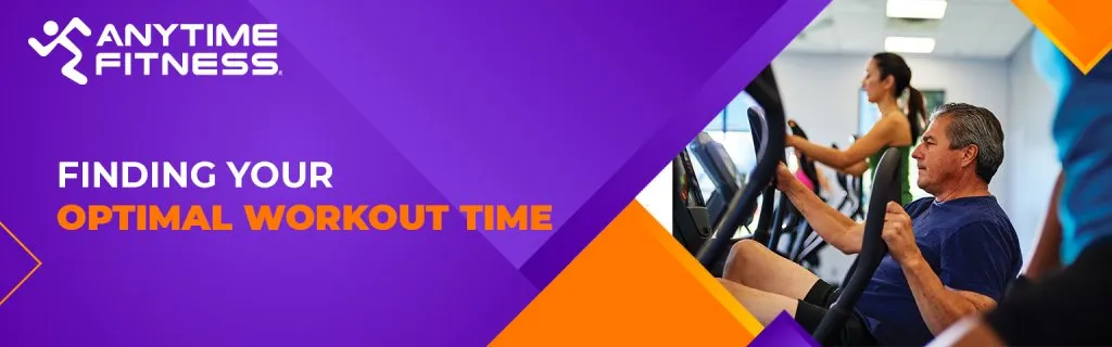 A purple and orange Anytime Fitness banner titled "FINDING YOUR OPTIMAL WORKOUT TIME." The right side shows a middle-aged man focused on a workout using an elliptical machine in a professional gym environment.