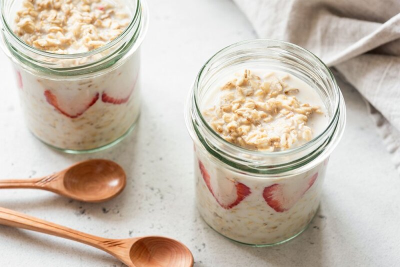 High-fiber, high-protein vanilla overnight oats in glass jars.