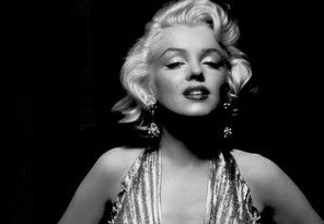 Black-and-white portrait of a woman in classic Hollywood-style makeup