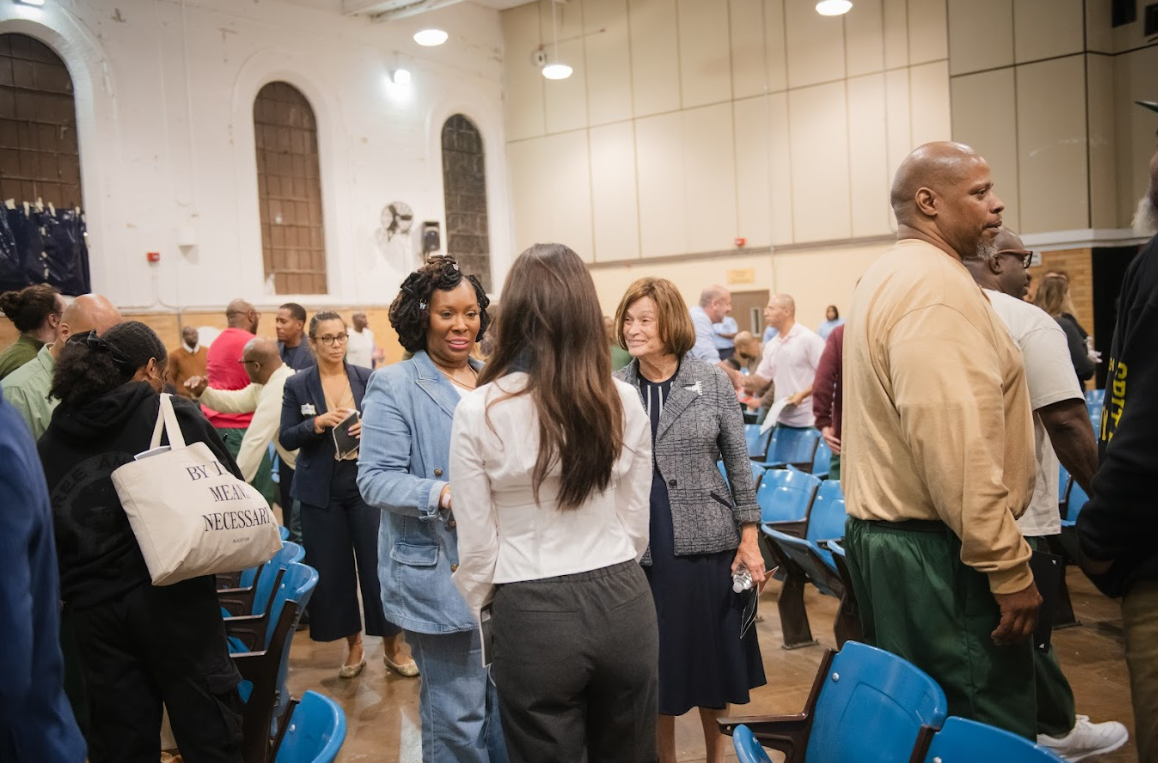 Guests mingling in the chapel at the Sing Sing Film Festival.