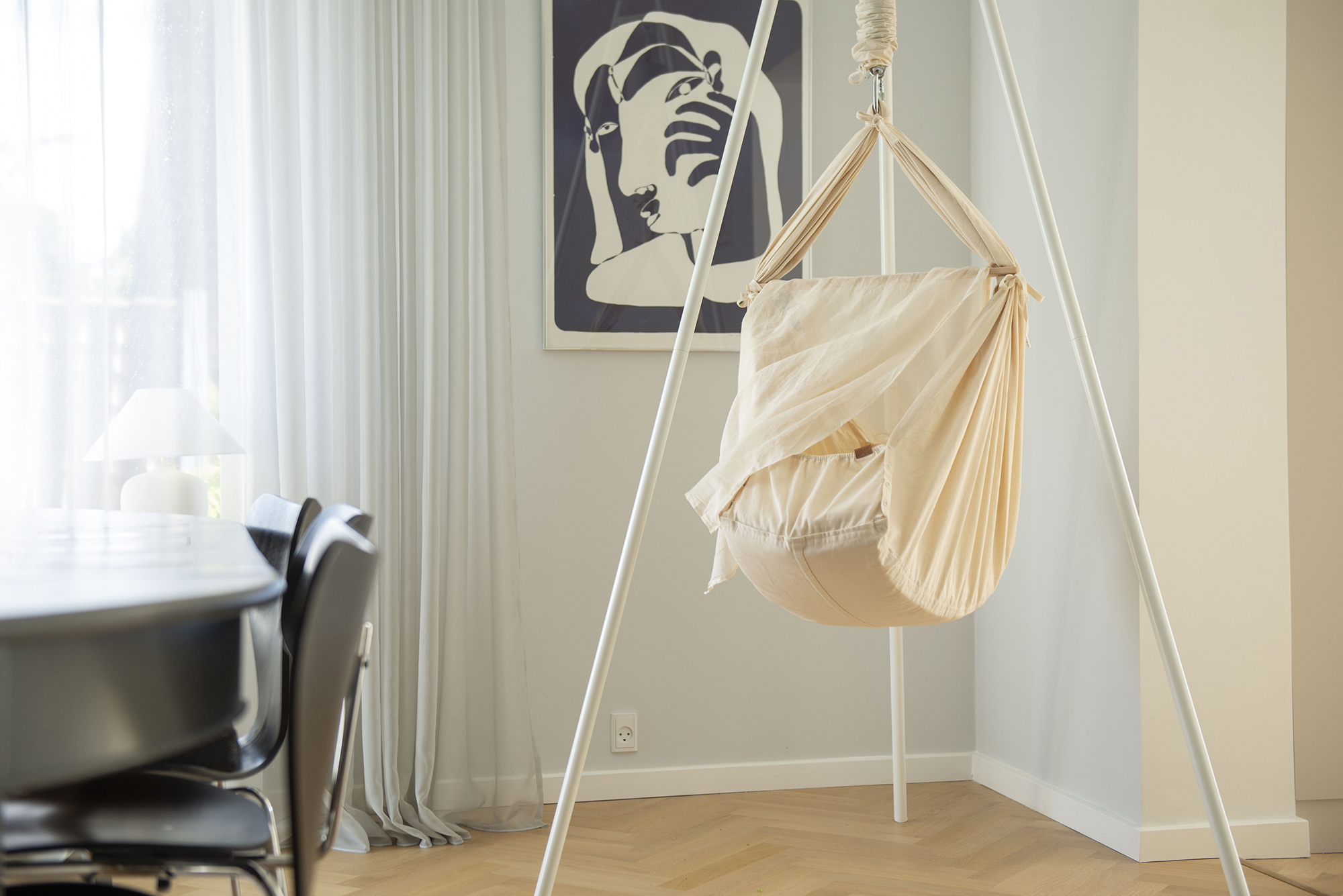 Baby in a Membantu sling cradle