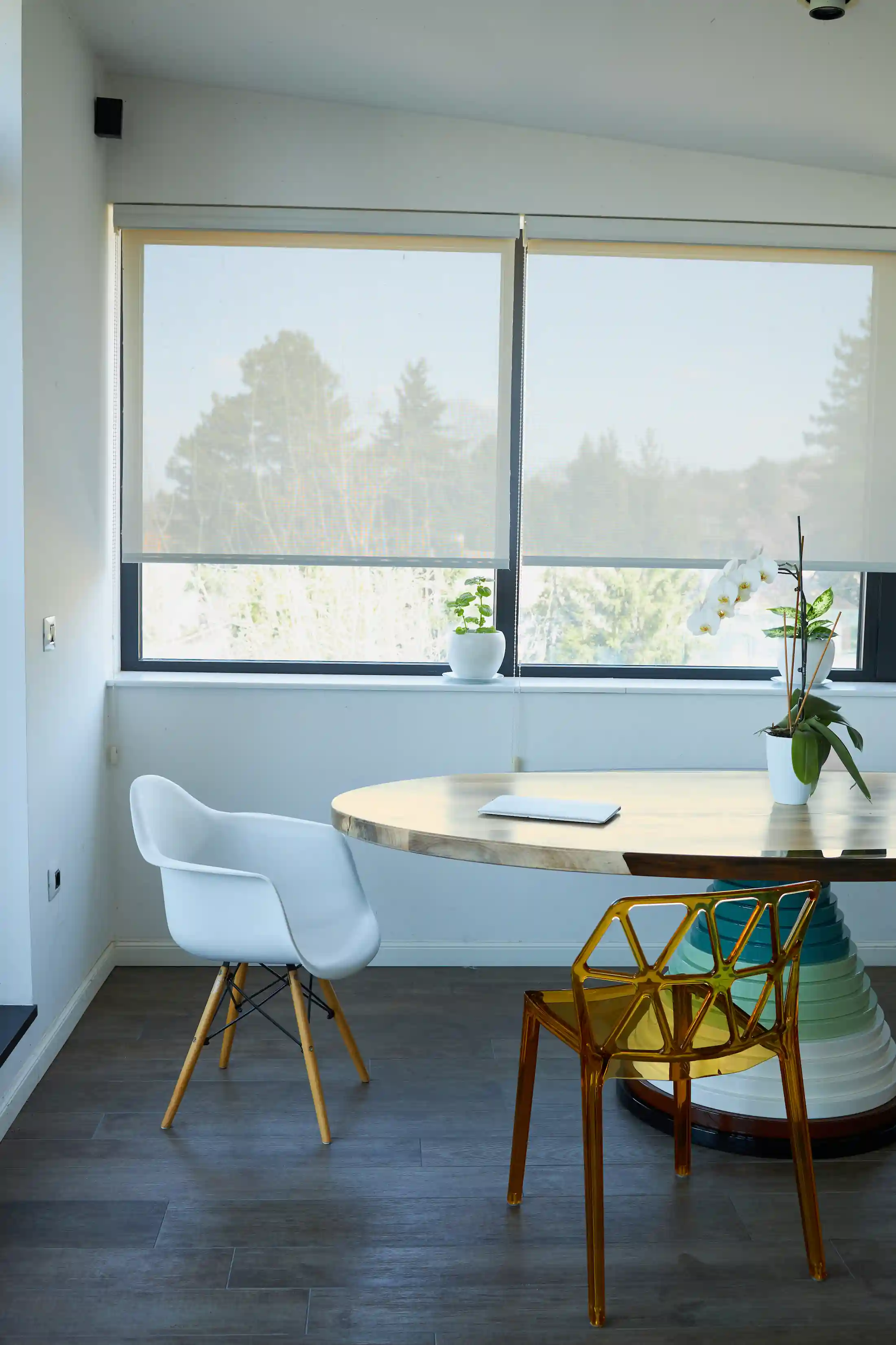 Roller blinds for windows in Bangalore living area, roller shades curtains enhancing light comfort.