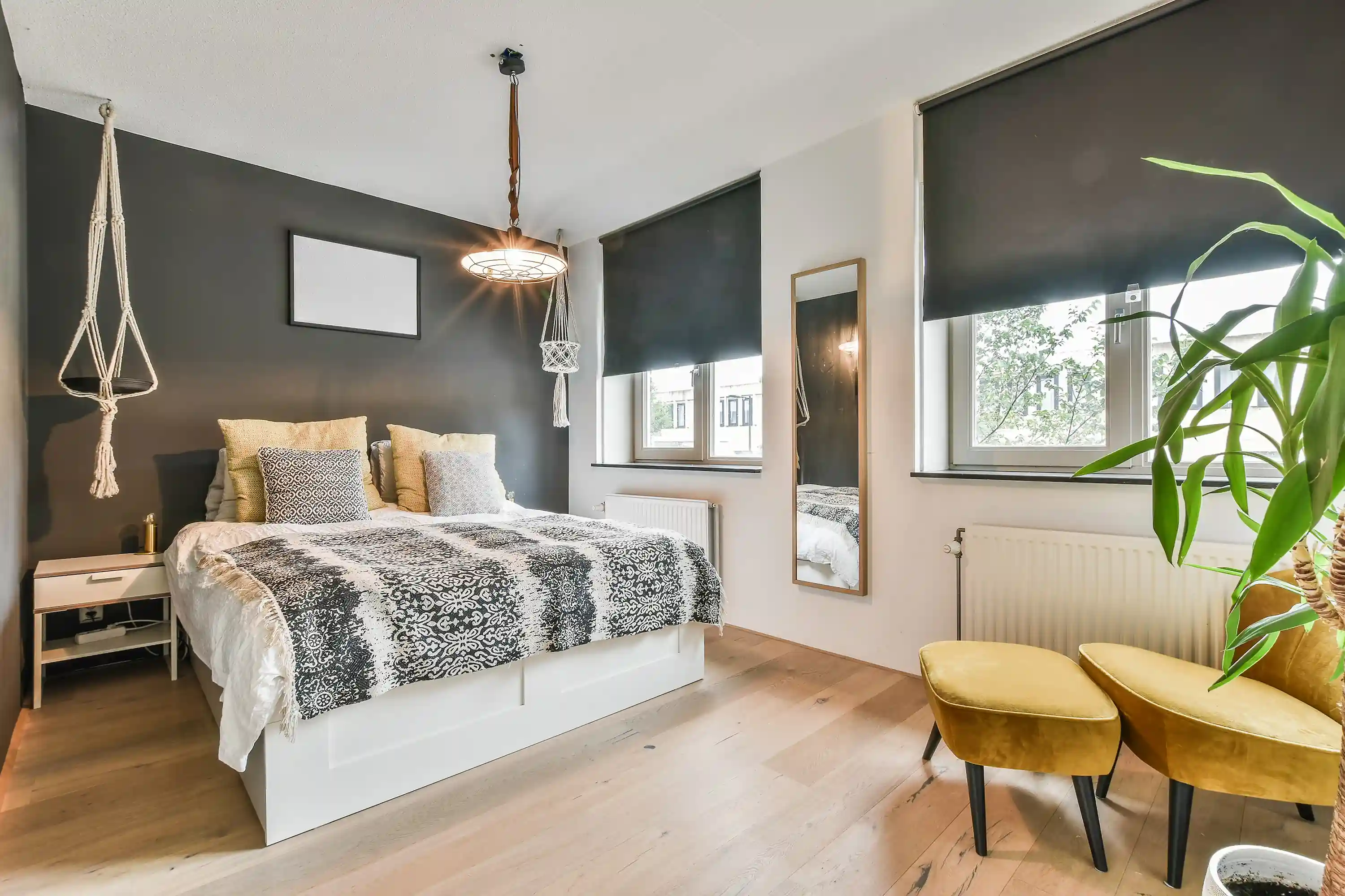 Subtle roller blinds in Bangalore modern bedroom, stylish curtains and blinds aesthetic