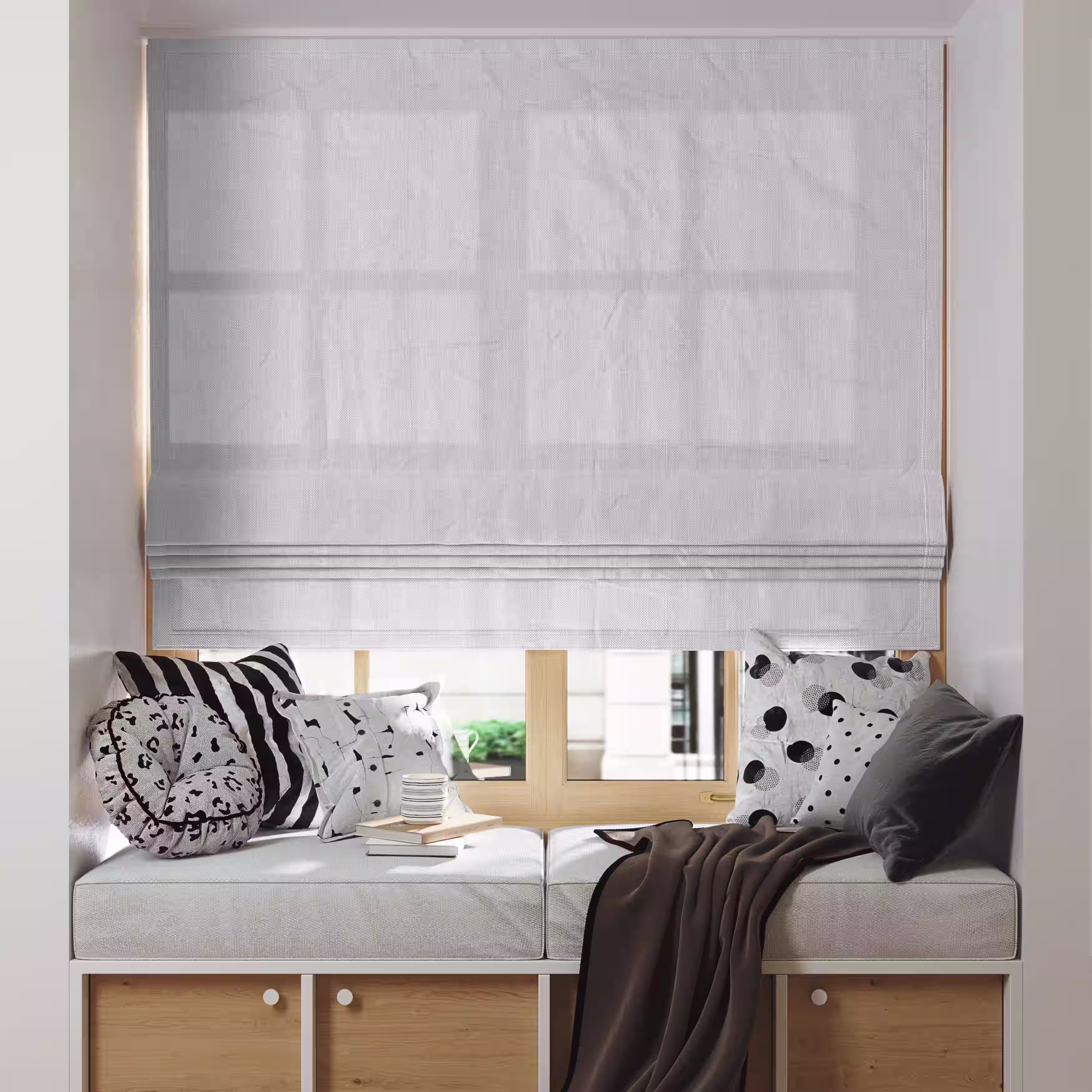 Roman blinds for windows lowered halfway filtering natural daylight softly 